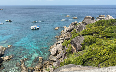 Landscape and crystal clear water of the Similan Island (Ko 8) as seen from the Sail Rock Viewpoint of Mu Ko Similan National Park in Thailand.