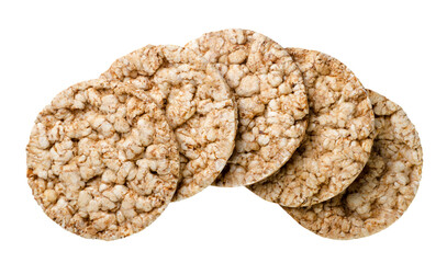 Round puffed rice cakes lie in a row on a white. Top view
