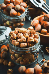 Organic shelled hazelnuts in a glass jar. Nut kernels. Close up.