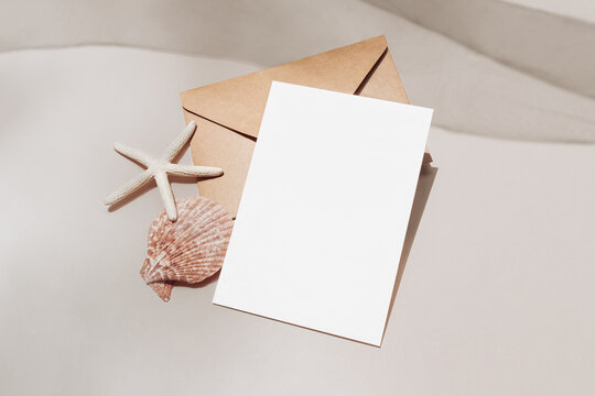 Beach themed 5x7 blank card mockup with envelope and starfish, sample template invitation for displaying various designs