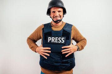 Reporter with bulletproof vest on white background.