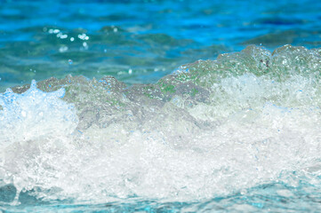 Soft ocean wave. Water movement. Close up of gentle ocean wave.