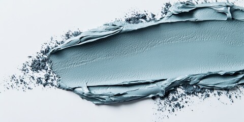 Blue clay mask on a white background, this cosmetic product is perfect for skincare routines. The blue clay mask rejuvenates the skin, offering a refreshing and nourishing experience.