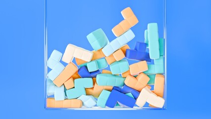 A vibrant array of colorful pastel blocks in a clear container, contrasted against a calm blue background, ideal for playful designs, educational purposes, and creative projects