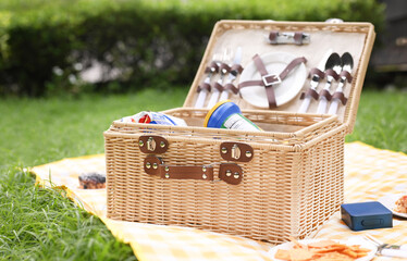 A wooden basket filled with some snacks