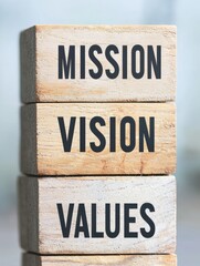 Mission Vision Values Highlighted on Stacked Wooden Blocks