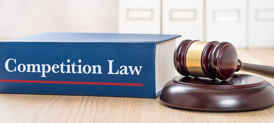 A law book with a gavel - Competition law