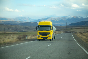 Truck driving at the highways. Transportation. Delivery