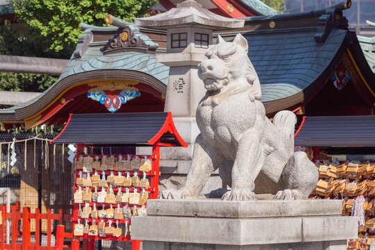 lion-dog stone statue in kanda myojin shinto shrine in chiyoda city