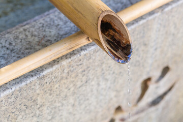 purification place with water called chozuya in oji shinto shrine