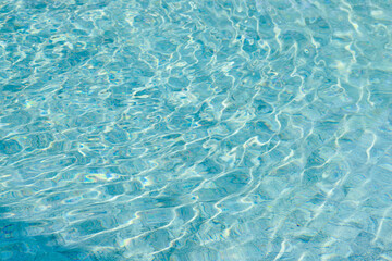 Obraz premium abstract blue color water wave in swimming pool pure natural swirl pattern texture