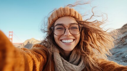 Joyful woman enjoys a sunny day at Golden Gate Bridge in San Francisco