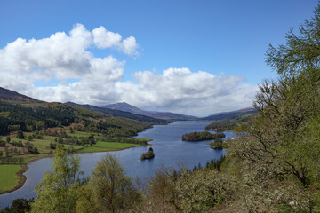 Breathtaking view of the tranquil Loch Tummel from Queen's View in Scotland under a clear blue sky