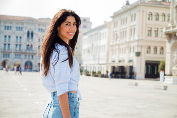 Beautiful  traveler woman on the street in Italy 