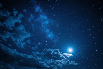 Fototapeta premium Bright full moon shining in a serene starry sky with clouds