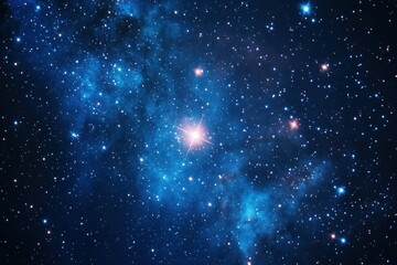 Naklejka premium Bright glowing star surrounded by nebulae and countless stars in deep space