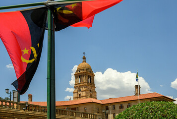 Angolan flags with the Union Buildings in the background