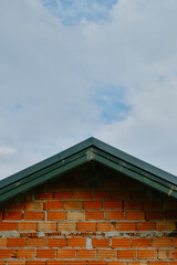 The gable of a house that is being built beautifully