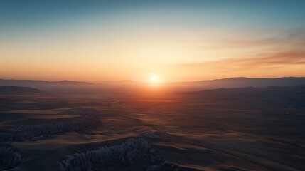 Stunning Sunrise Over Cappadocia's Rocky Landscape with Hot Air Balloons