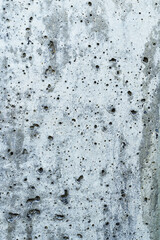Vertical concrete wall background, Seamless rustic solid surface concrete texture.