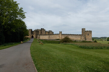 Visit to a historical castle surrounded by greenery on a cloudy day