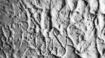 Sliding stone plaster in the image of a lifeless cold desert in the form of abstraction