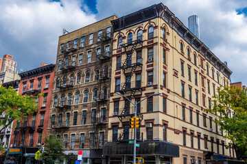 Obraz premium A view of fire escapes on buildings at the lower end of Central Park in Manhattan, New York, in the fall