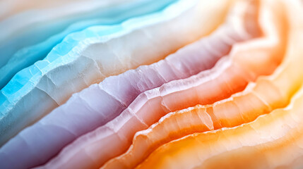 Colorful Layers of Natural Stone with Blue, Orange, and White Tones Highlighting Textures