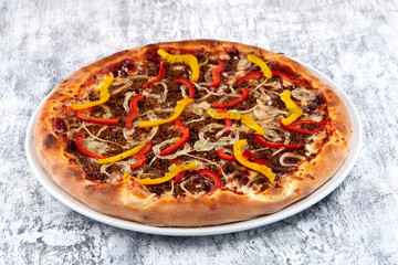 fresh pizza on the white plate