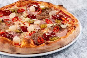 fresh pizza on the white plate