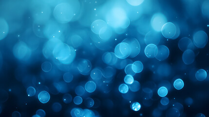 A bokeh background in blue tones.