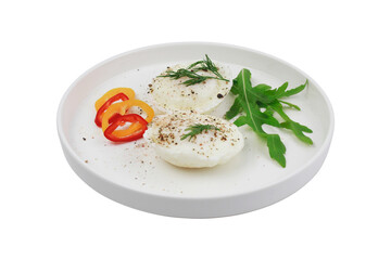 Delicate poached eggs served on a white plate with fresh herbs and colorful peppers for a healthy breakfast option