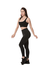 Portrait of woman in sportswear on white background