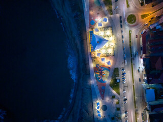 Vibrant Seaside Promenade at Night, Lit by Colorful Lights. High-angle, aerial view of a lively seaside promenade at night. Karasu Sakarya Adapazari Turkiye Turkey Drone shot Blacksea Karadeniz  © Turkey Photo