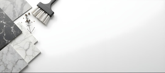 Assorted marble and stone tiles, including white, gray, and beige colors, arranged on a flat surface. 