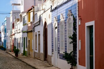 Colorful house facades in the old town of Olhão, Algarve, Portugal