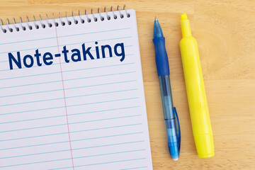 Note-taking supplies with pens and highlighter