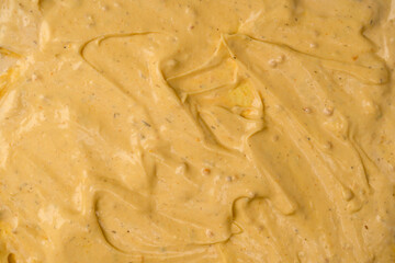 Yellow sauce splashes as a background.