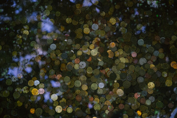 coins in a fountain under water