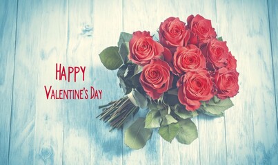 A rustic wood background features Happy Valentine's Day calligraphy and a rose bouquet