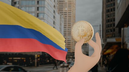 Golden bitcoin held by a hand with a waving Colombia flag in the background against a modern urban cityscape