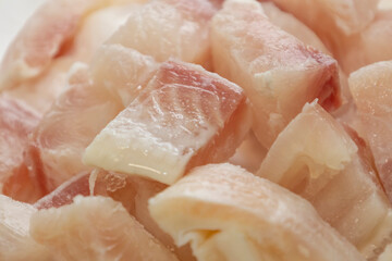 Pangasius fish fillet by pieces. Fresh fish fillet.
