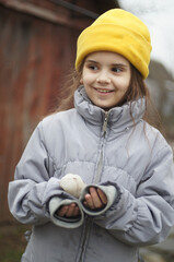 street portrait of a little girl, expressive eyes, natural beauty
