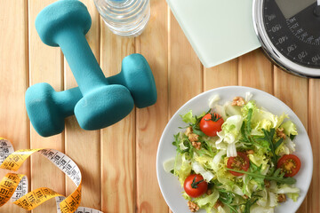 Good nutrition exercise and weight control with equipment top view