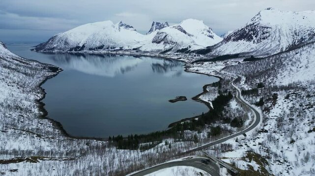 Aerial view of fjords and mountains, crystal clear water in Bergsbotn, Norway