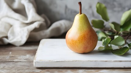 Fresh pear on cutting board kitchen setting food photography natural light minimalist design