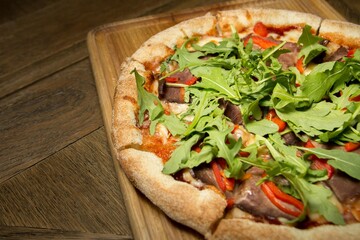 pizza with herbs and meat