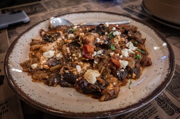 Traditional Greek plate with aubergine and feta cheese slowly cooked. Ioannina
