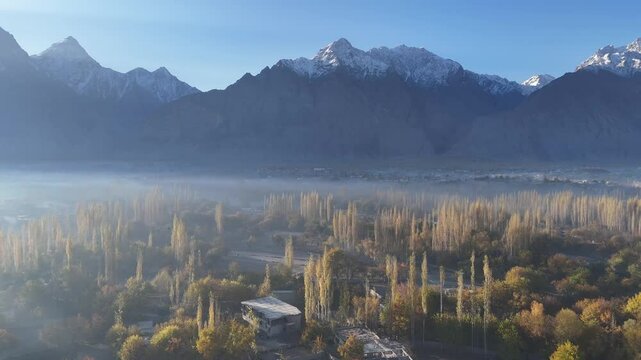 Vibrant aerial view of Hunza Valley, during autumn. Among the rocky mountains. Pakistan