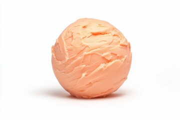 Obraz premium Peach-colored frozen dessert scoop, smooth texture.